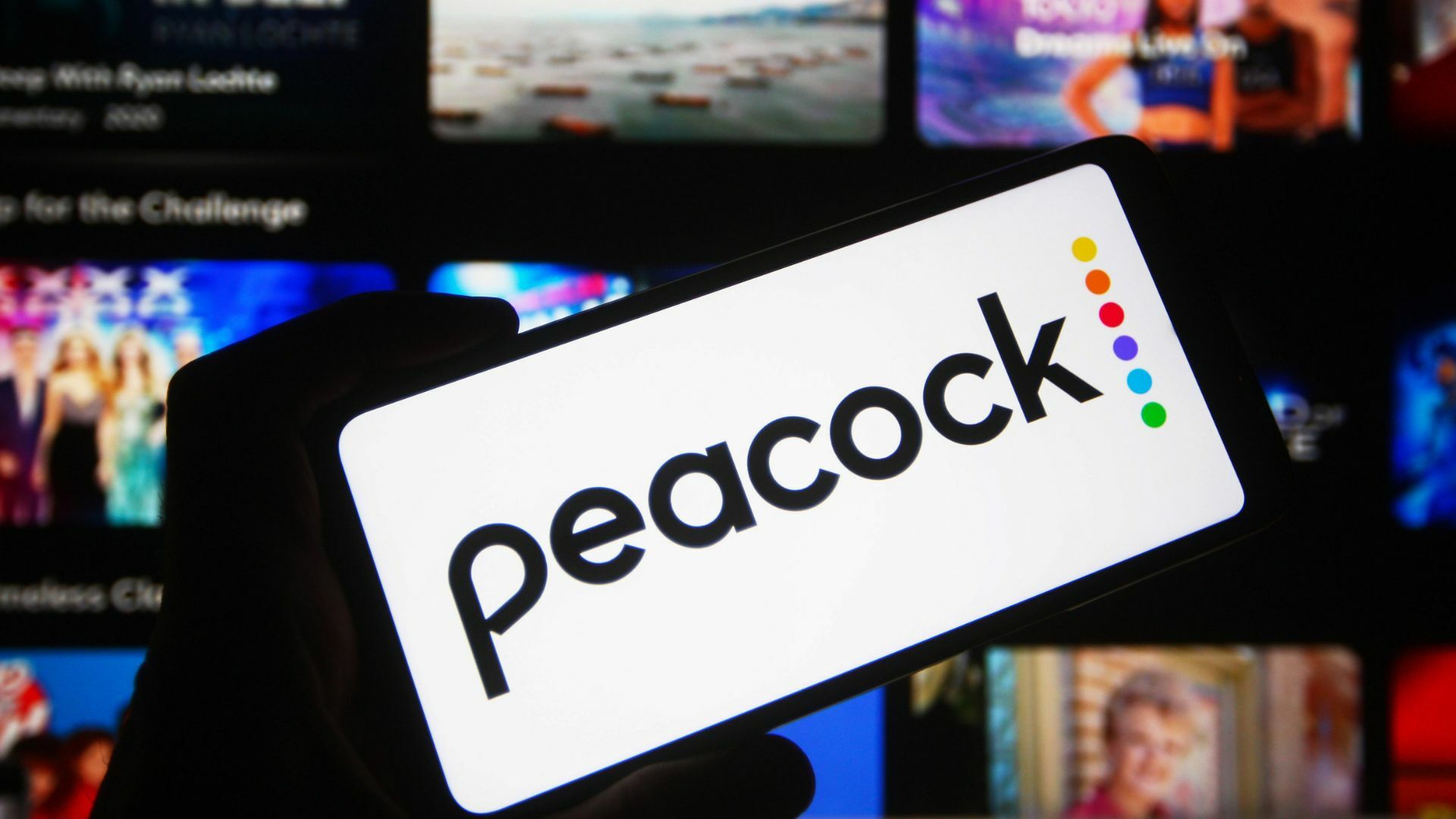 In this photo illustration a Peacock logo of an US video streaming service is seen on a smartphone.