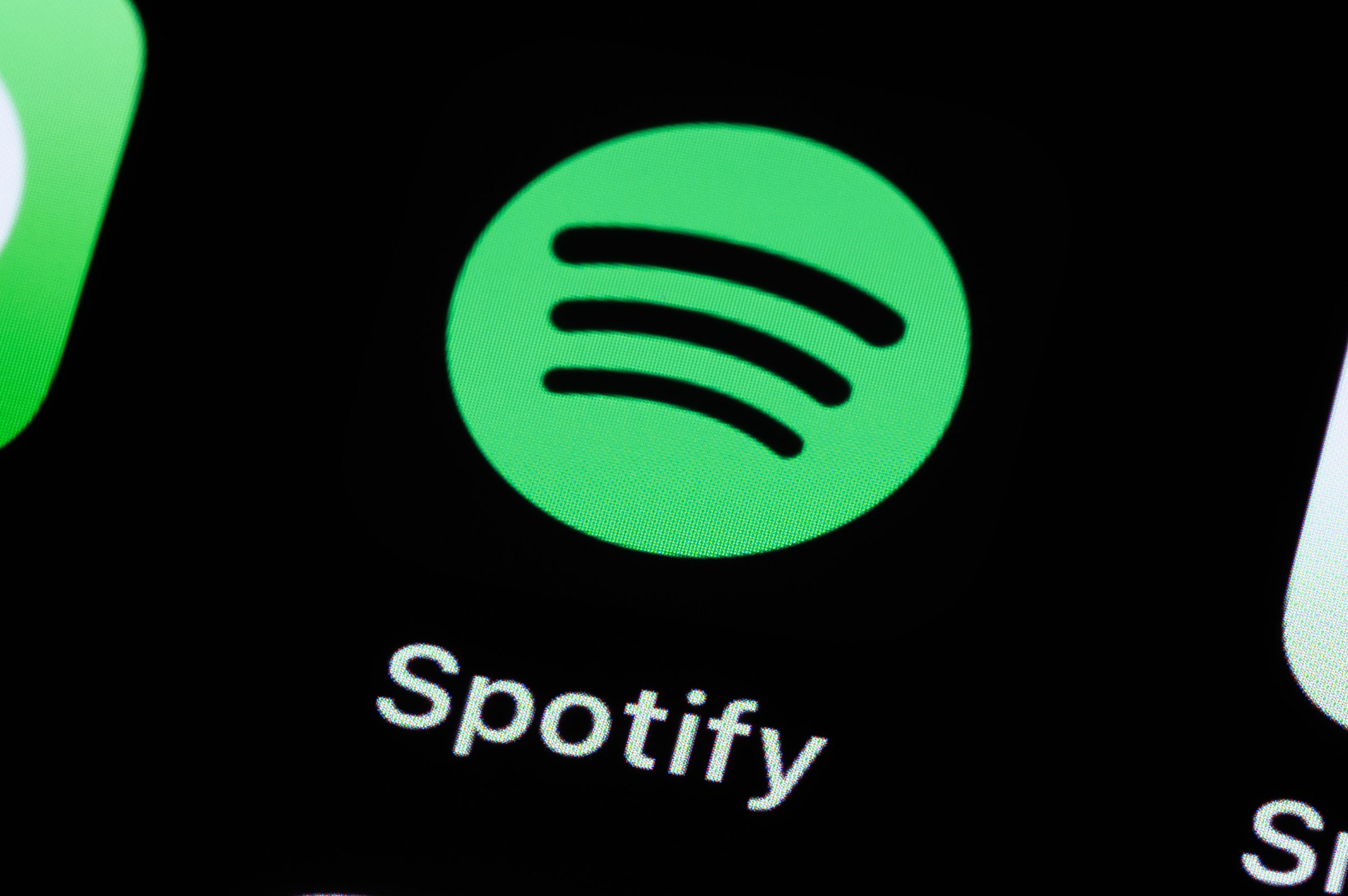 spotify logo on black backdrop