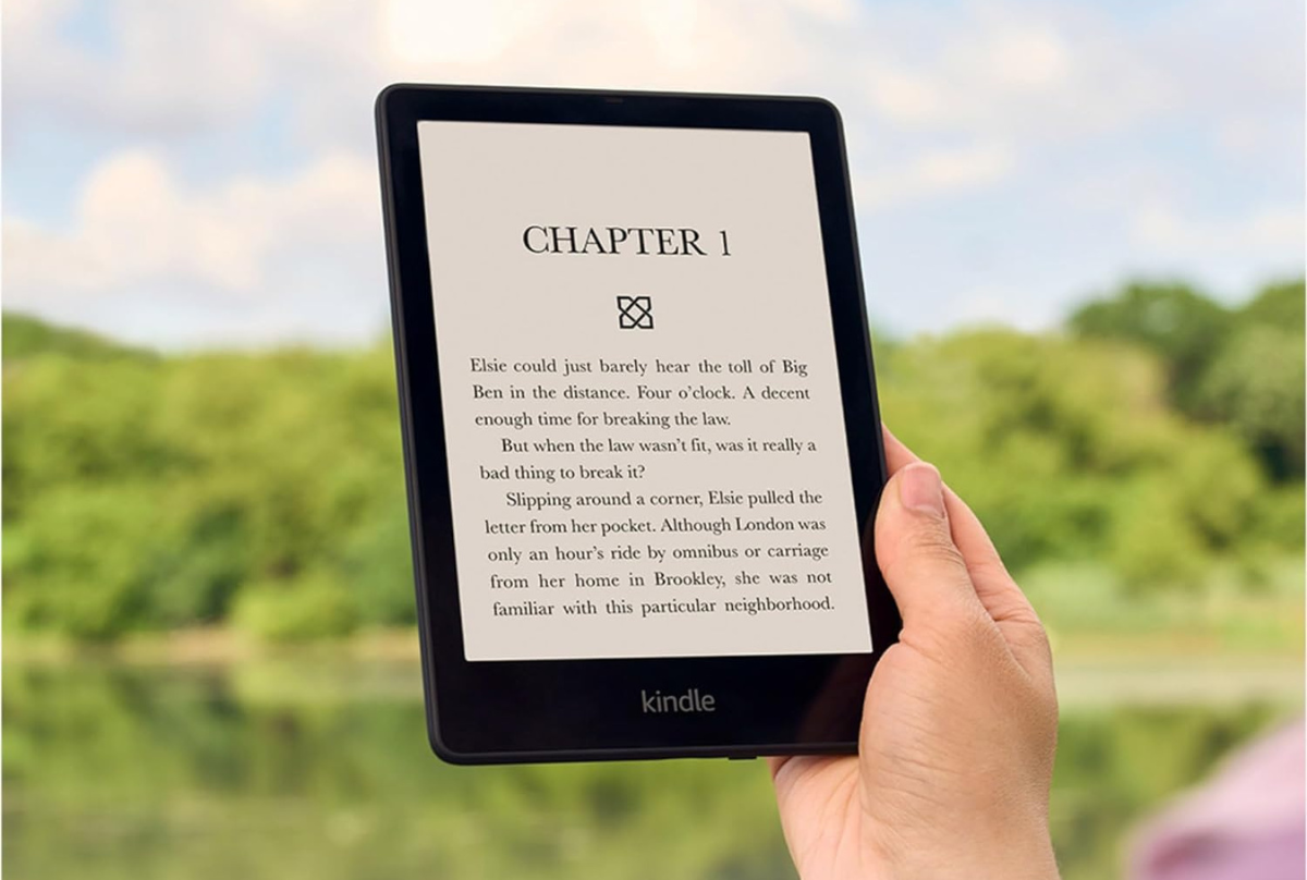person holding kindle paperwhite 