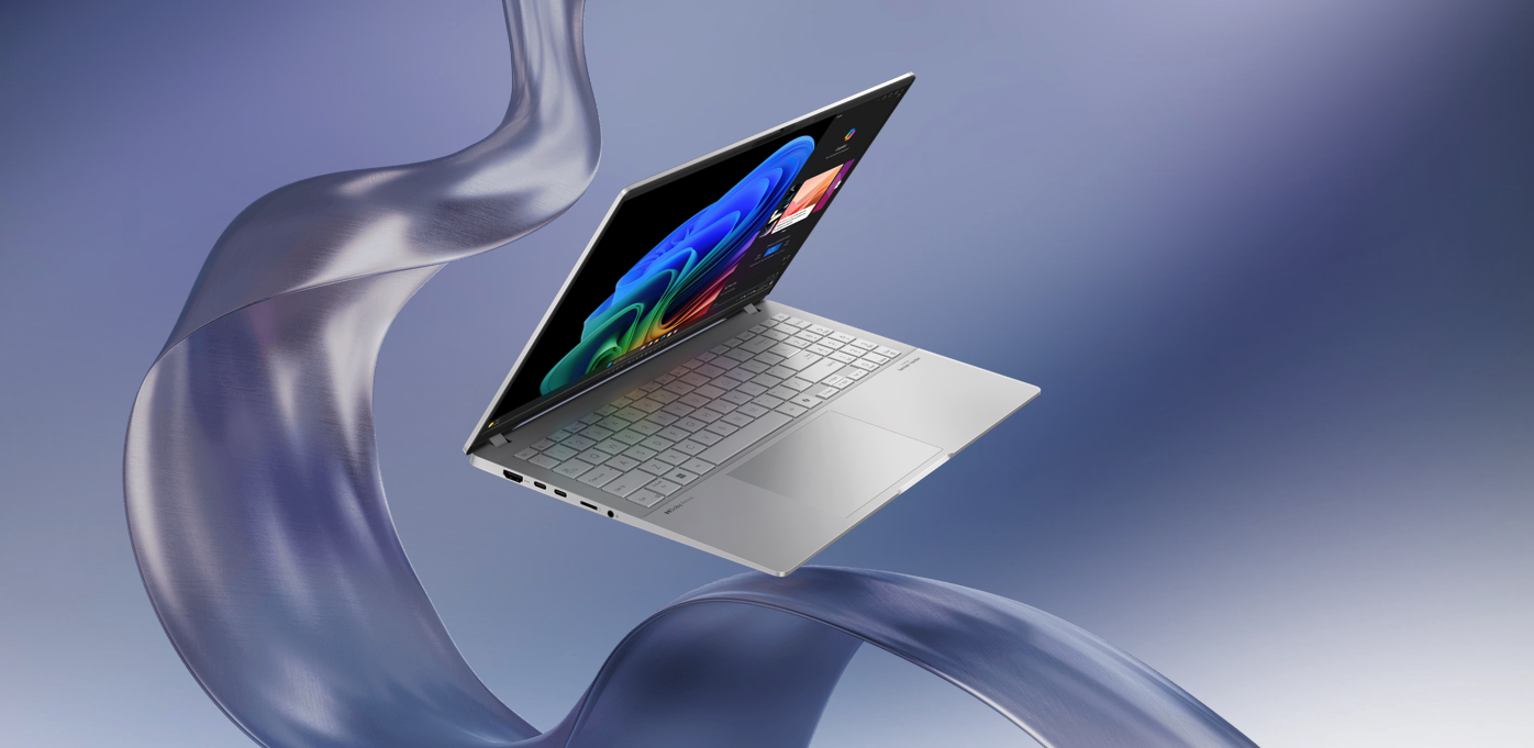 The Asus Vivobook on a silver background