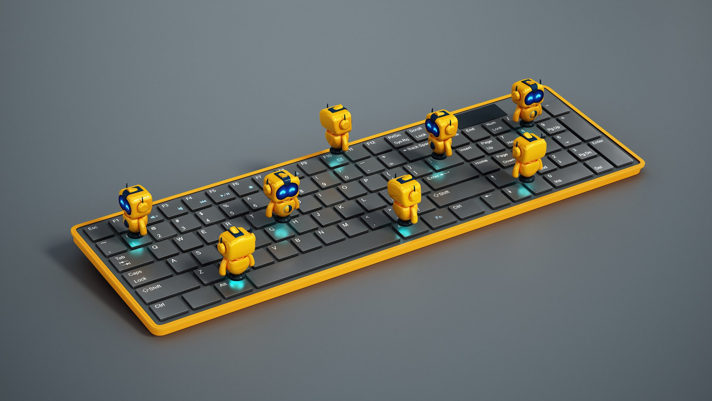 little yellow robots on keyboard