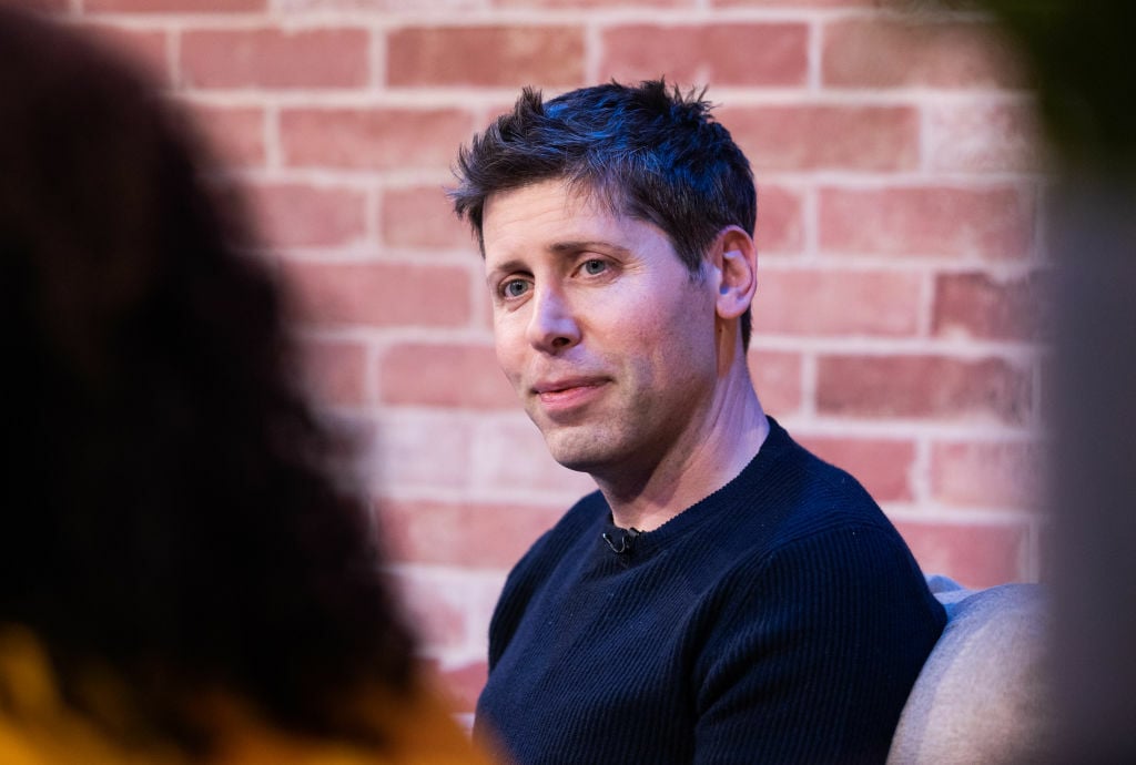 Sam Altman smiling during an interview at Bloomberg House on the opening day of the World Economic Forum (WEF)