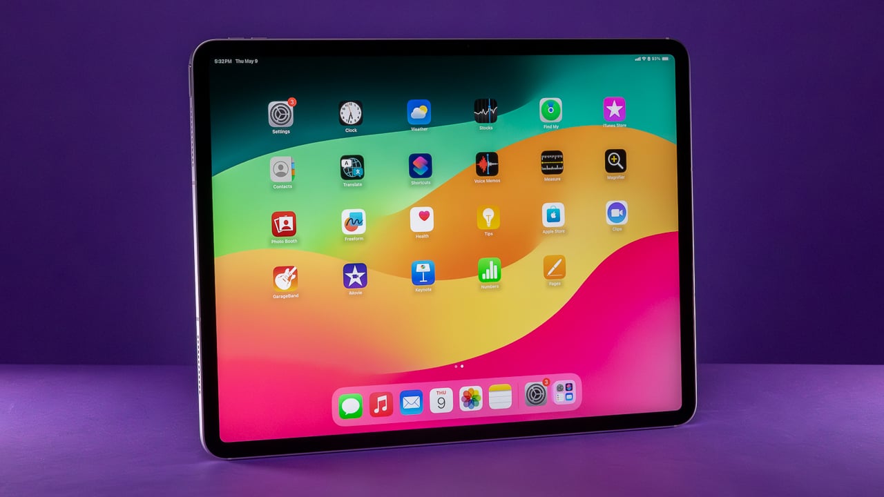 13-inch iPad Air against purple background