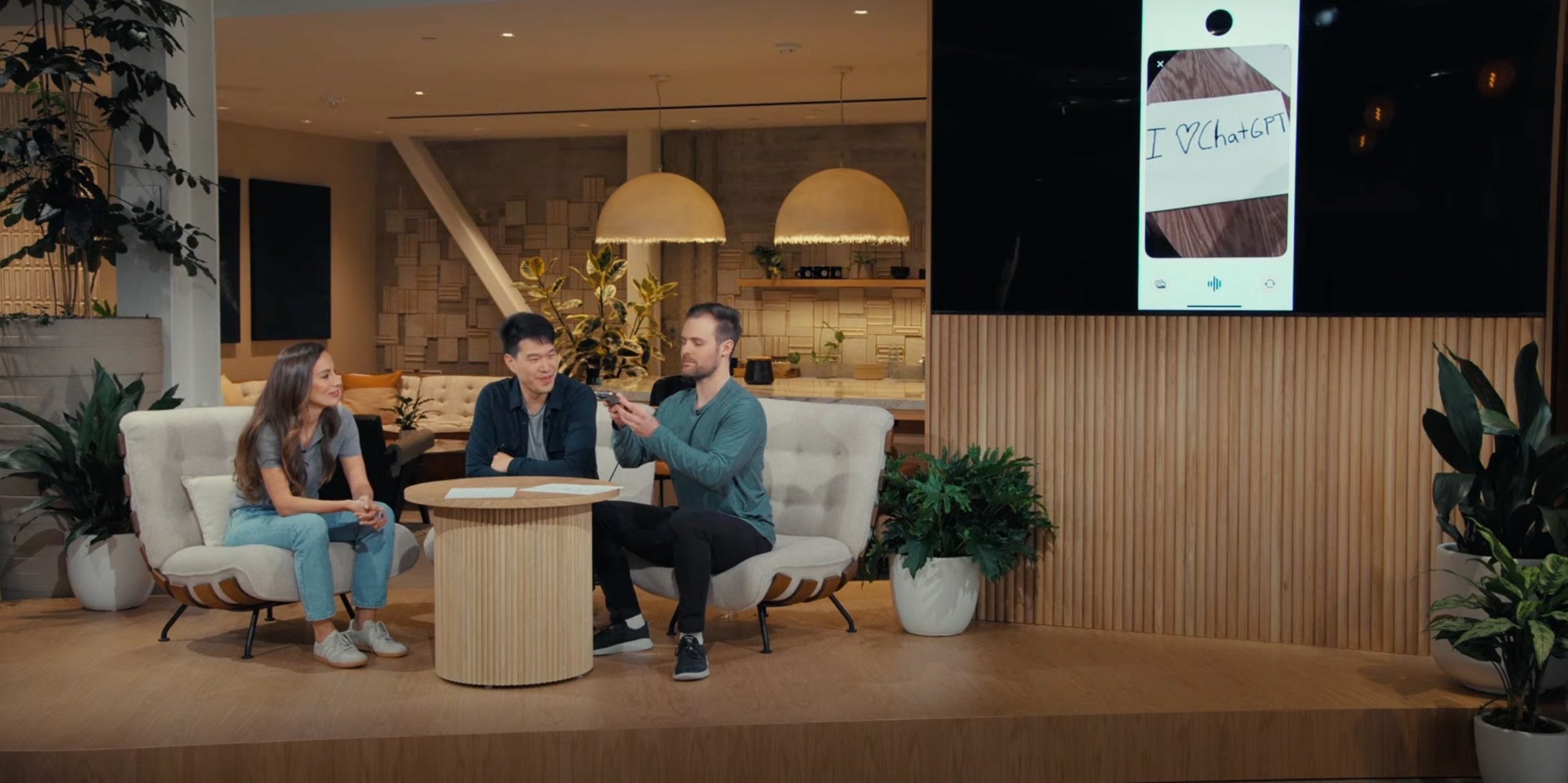 OpenAI's Mira Murati, Mark Chen, and Barret Zoph onstage at a live event