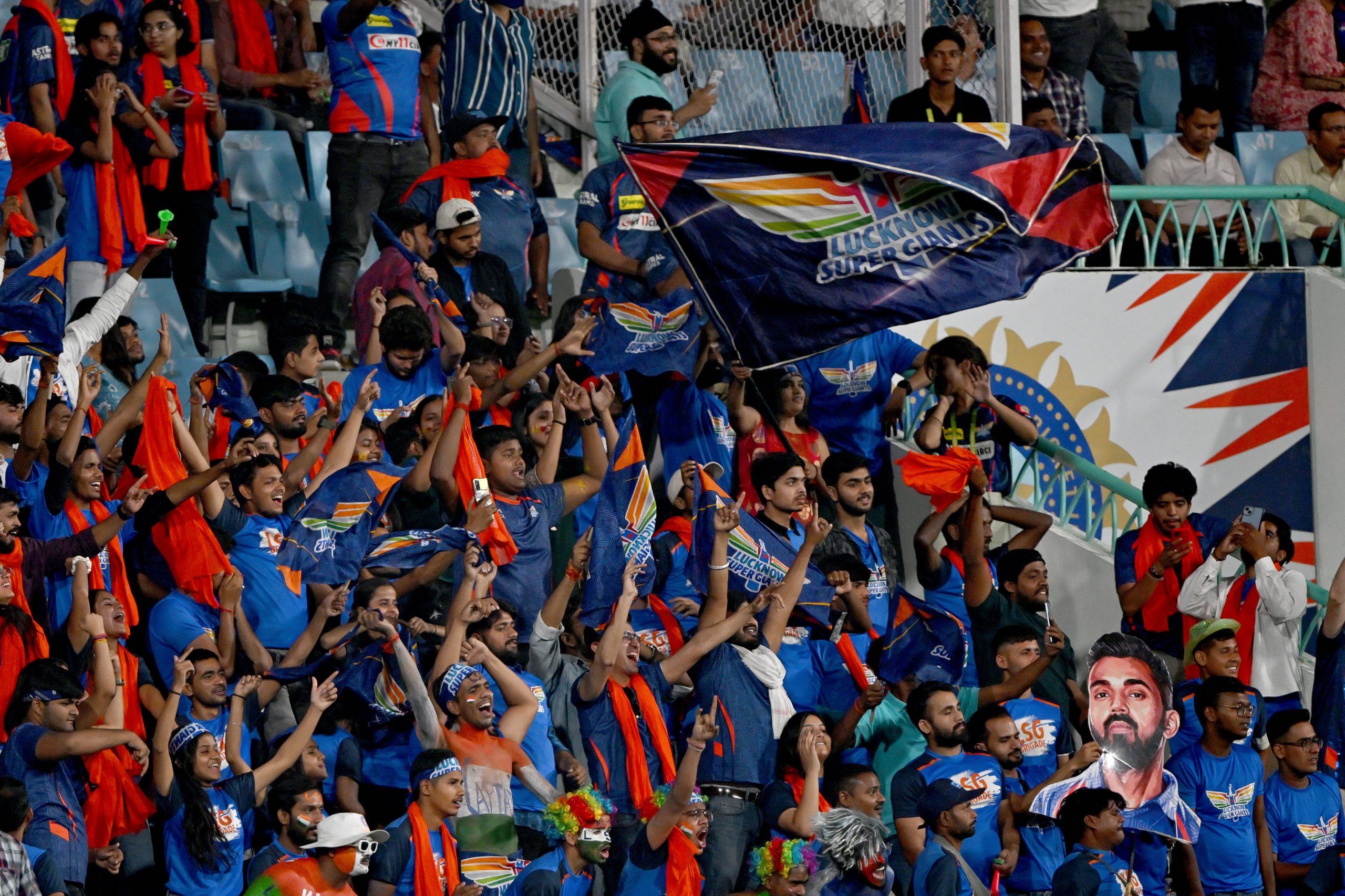 Fans cheer from stands with Lucknow Super Giants flag