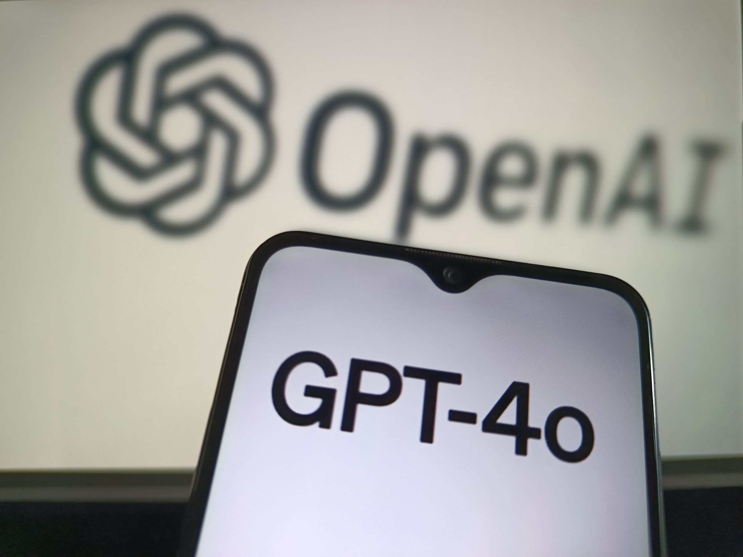 In this photo illustration, the sign of GPT-4o is seen