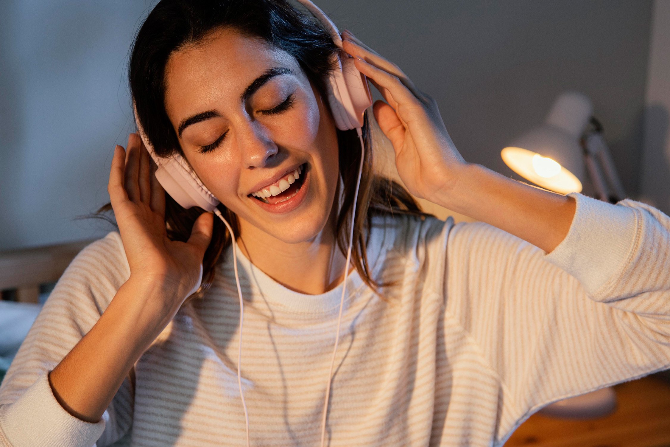 Women listening to AI song.