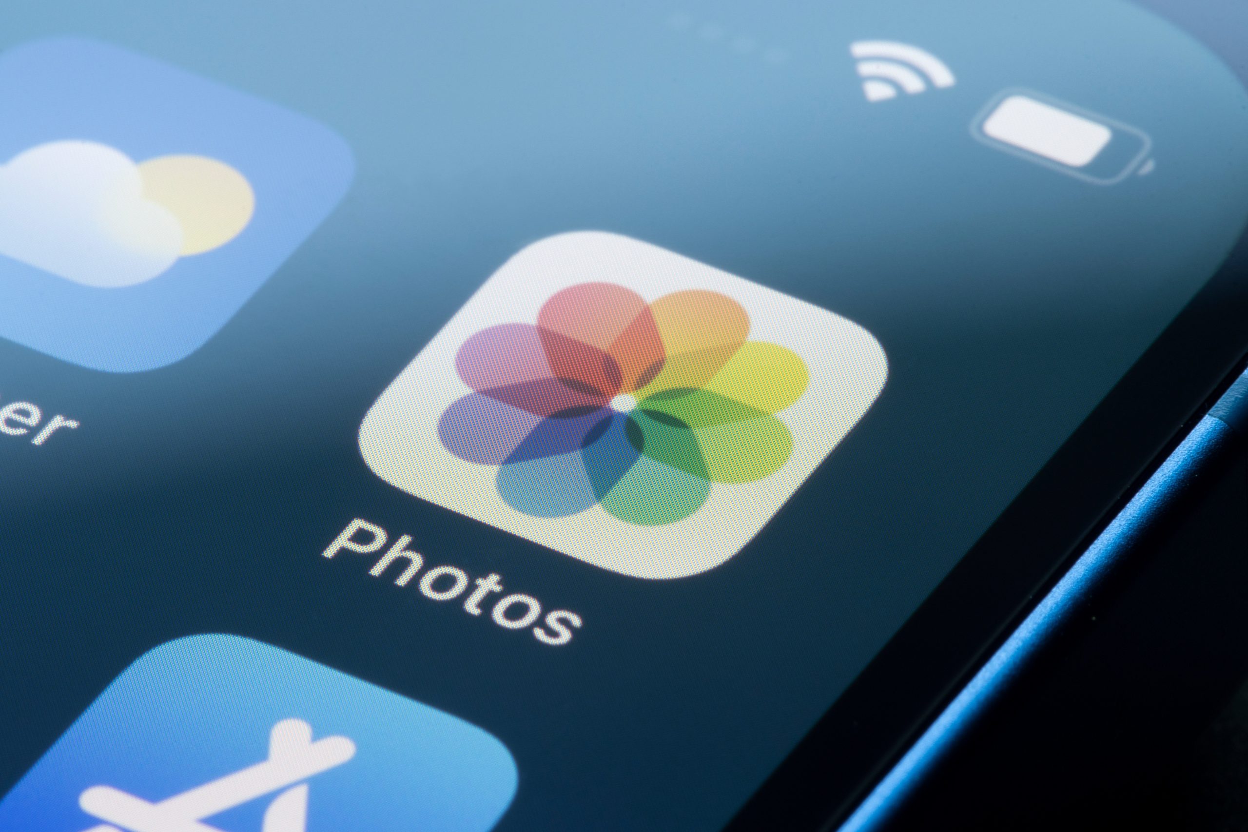 Apple Photos app icon on a smartphone screen