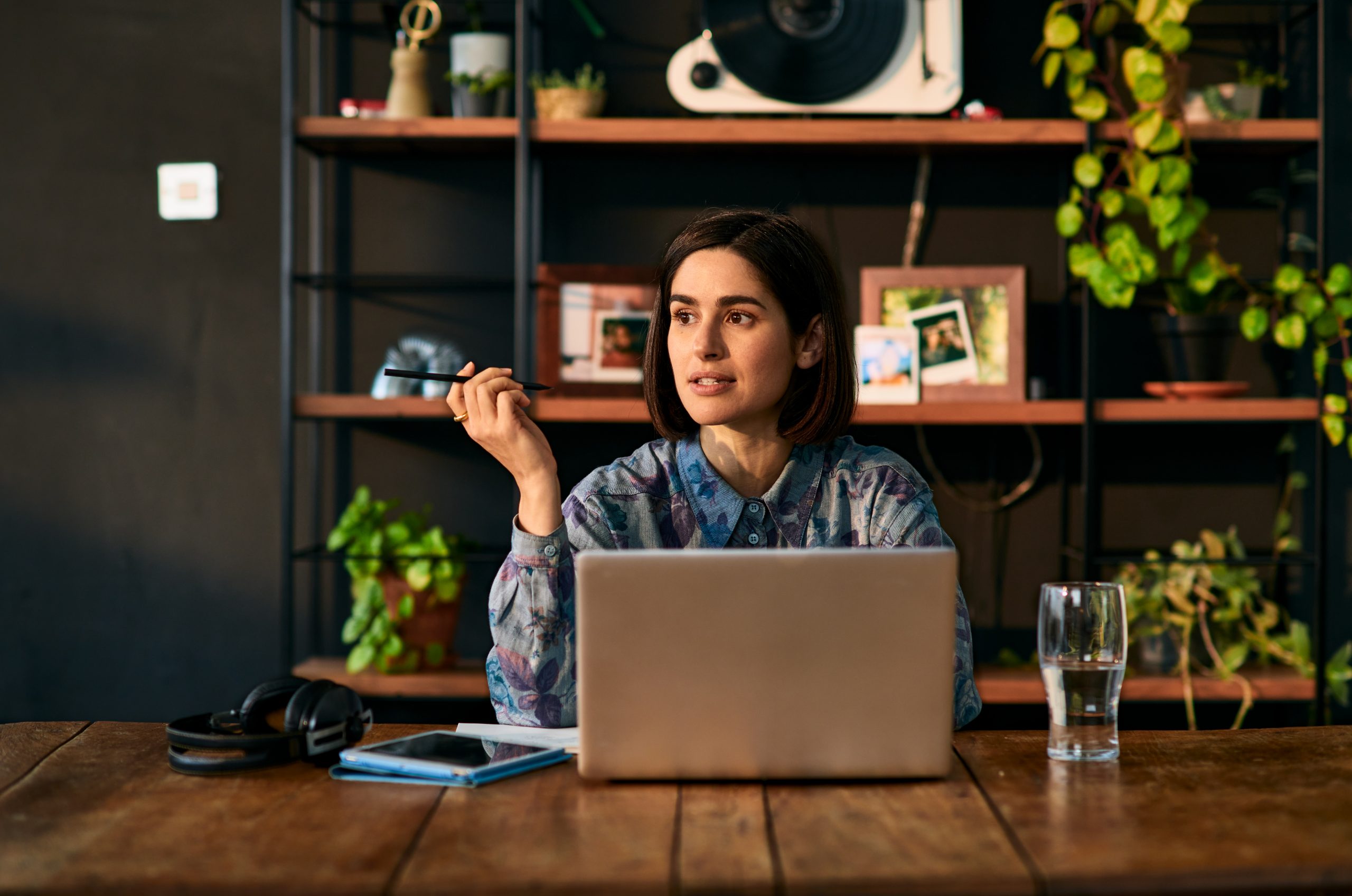 Woman working on to-do lists on laptop computer