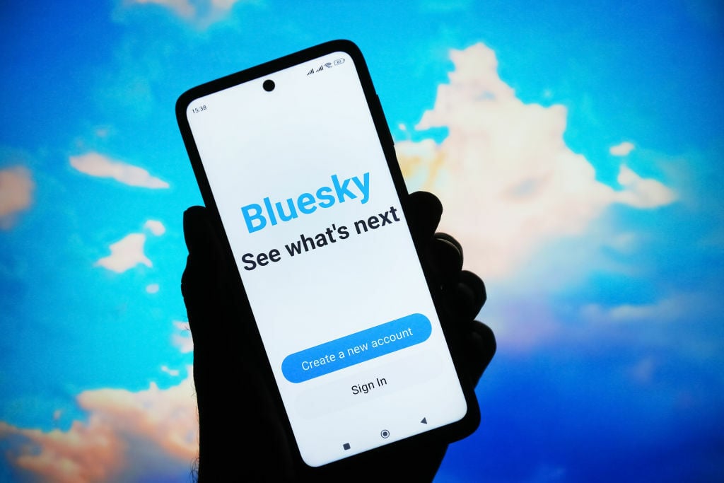 Bluesky Social logo of a social network is seen on a smartphone screen.