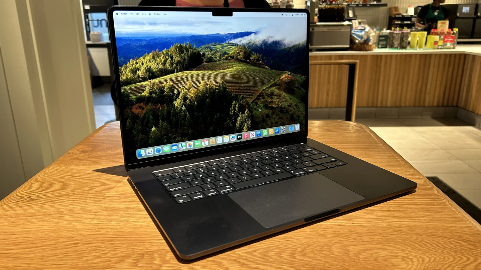15-inch m3 macbook air on a table in coffee shop