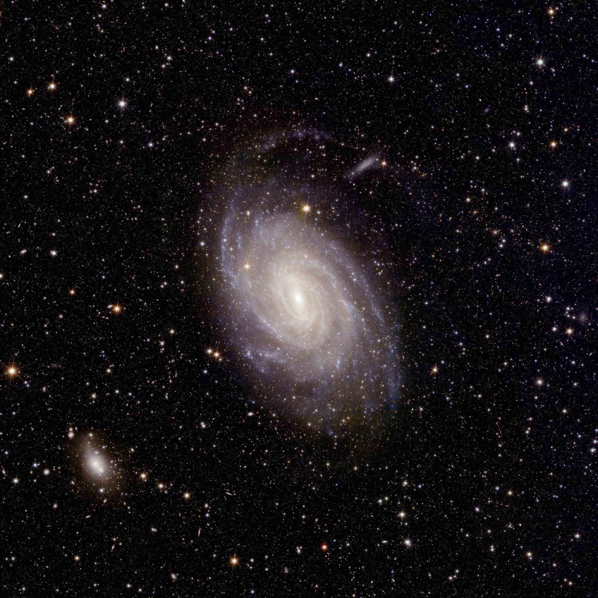 The spiral galaxy GC 6744 amid a background of many more galaxies.