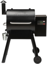 a black Traeger Grills Pro 575 on a whitebackground