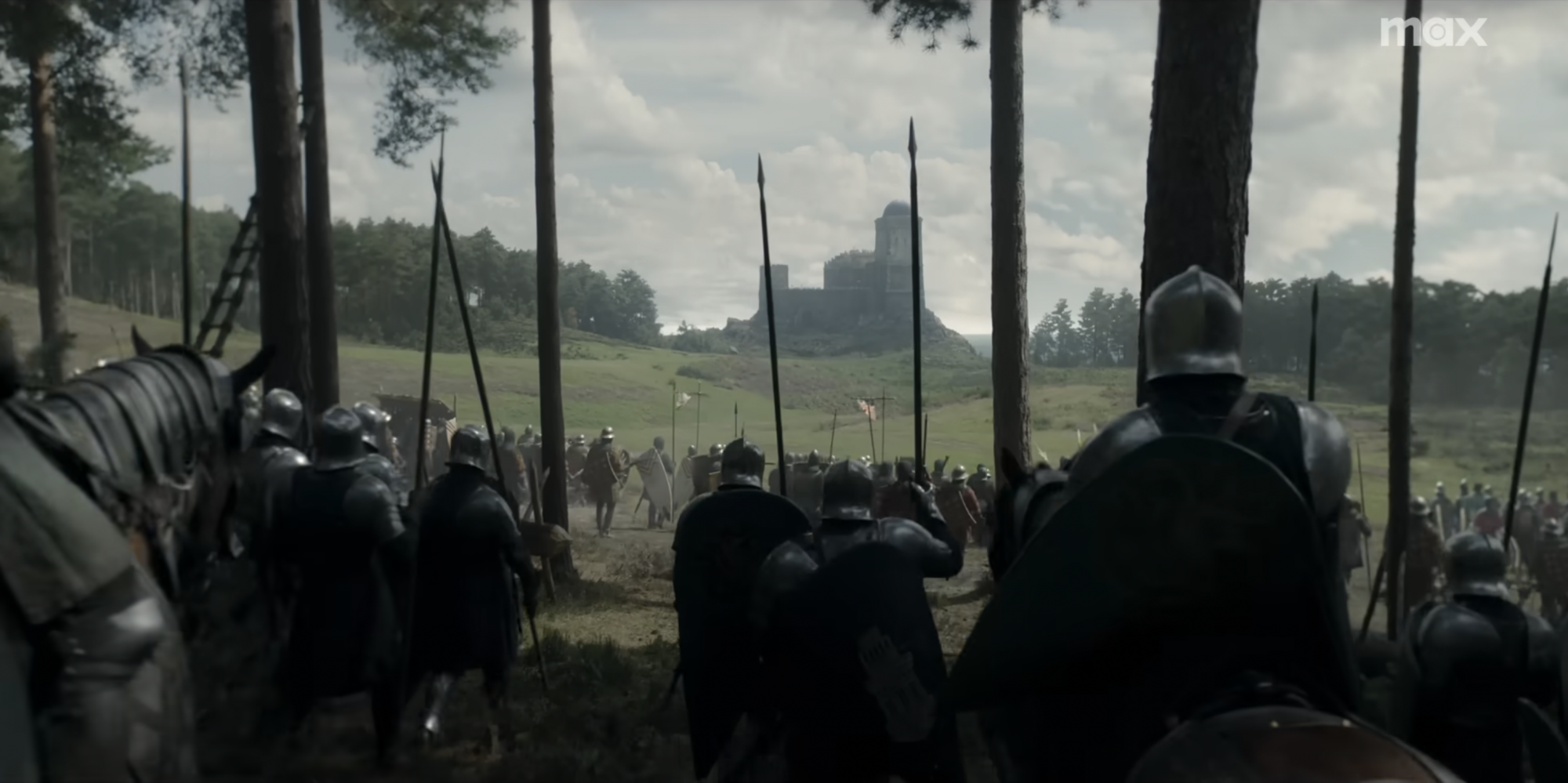 An army approaches a castle.