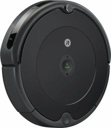 Black Roomba robot vacuum with on/off button in middle