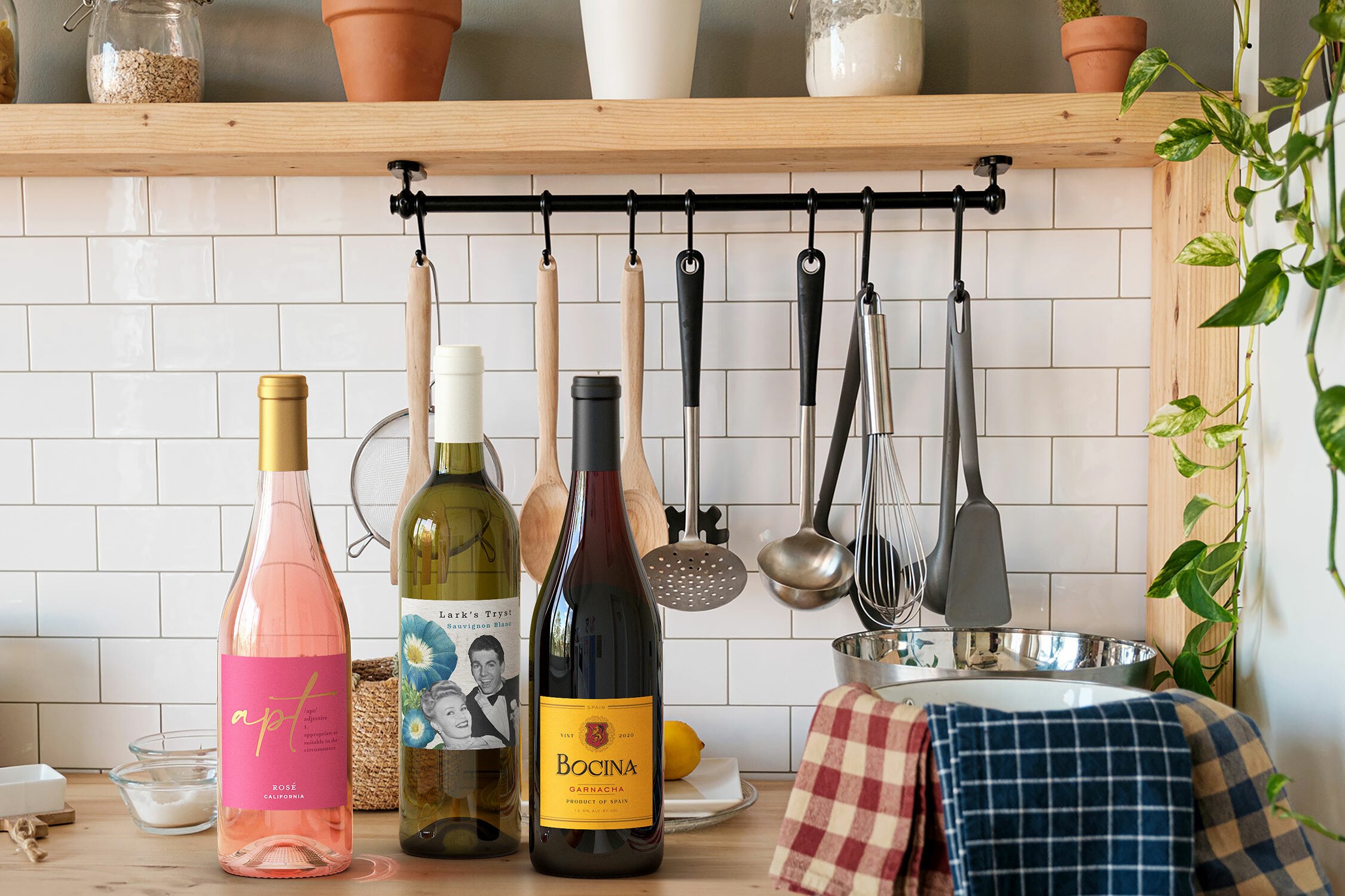 Wine varieties on table.