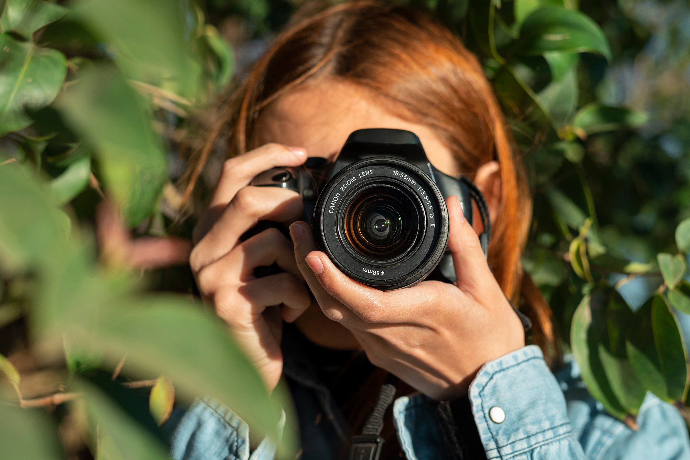 Woman taking photohraph.