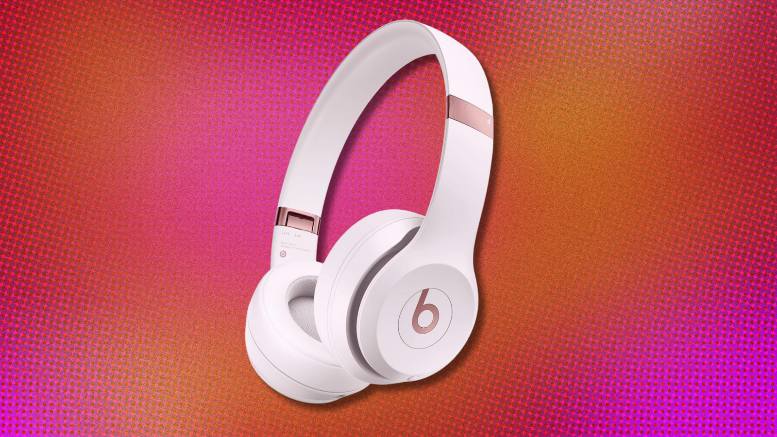 Beats Solo 4 on orange and pink abstract background