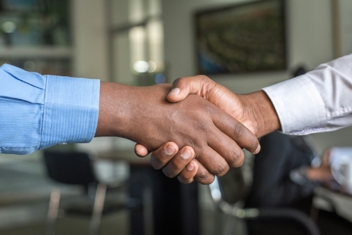 Two businessmen shaking hands