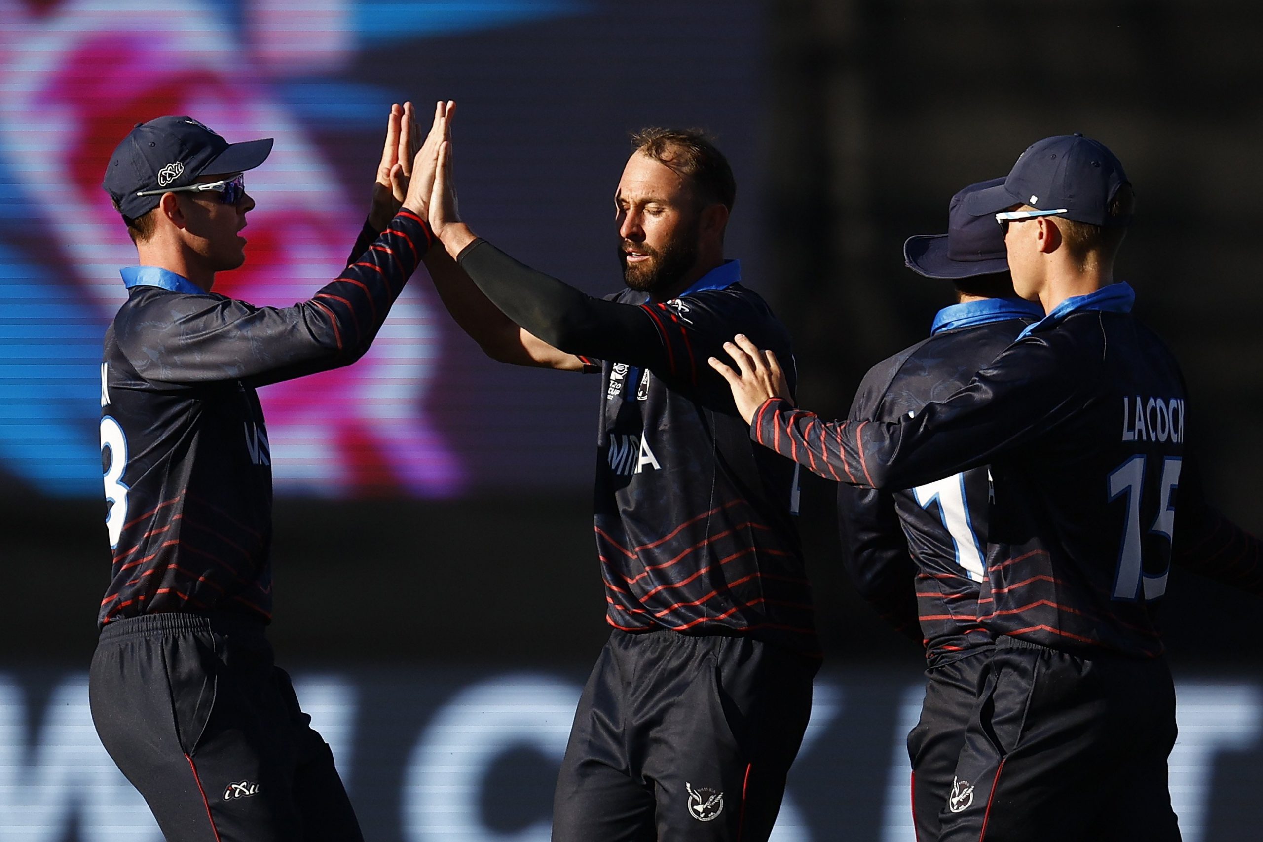 Jan Frylinck of Namibia celebrates with team mates