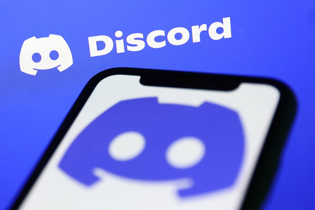 Discord logo on phone screen