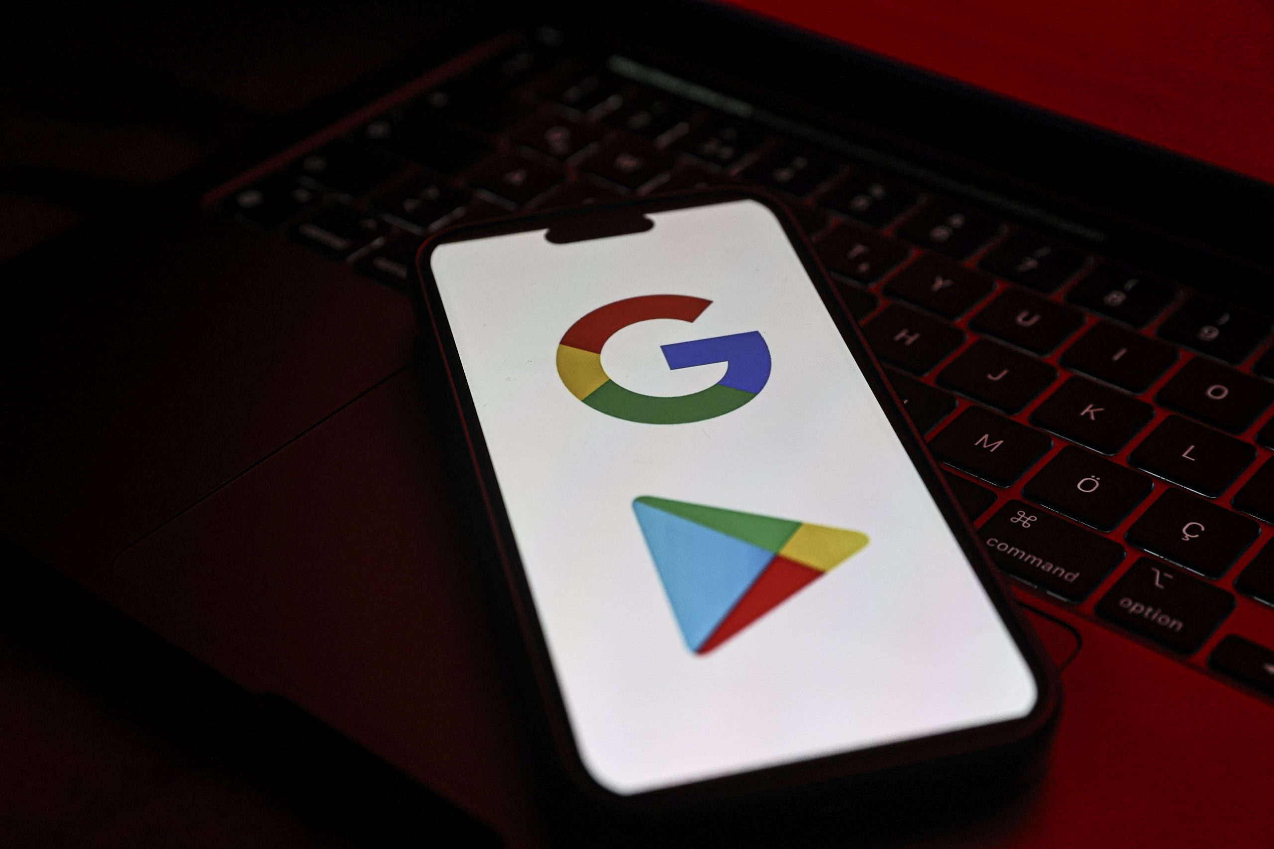 A phone displays the Google logo and Google Play store logo.