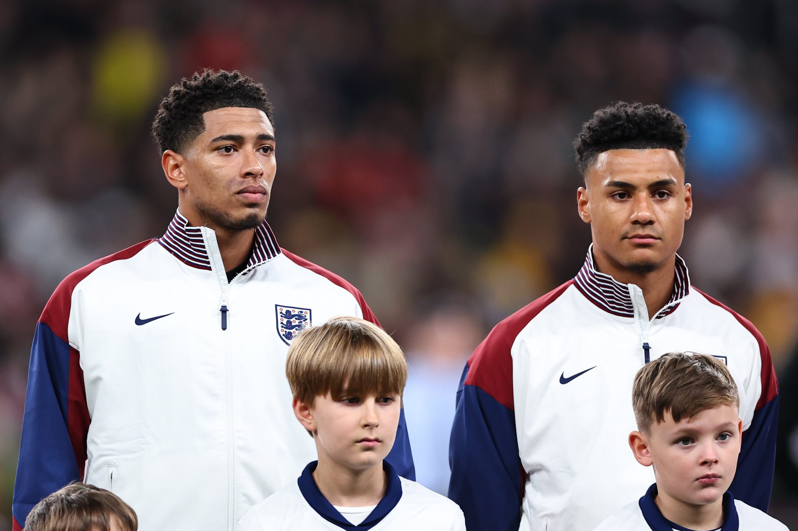 Jude Bellingham and Ollie Watkins of England line up