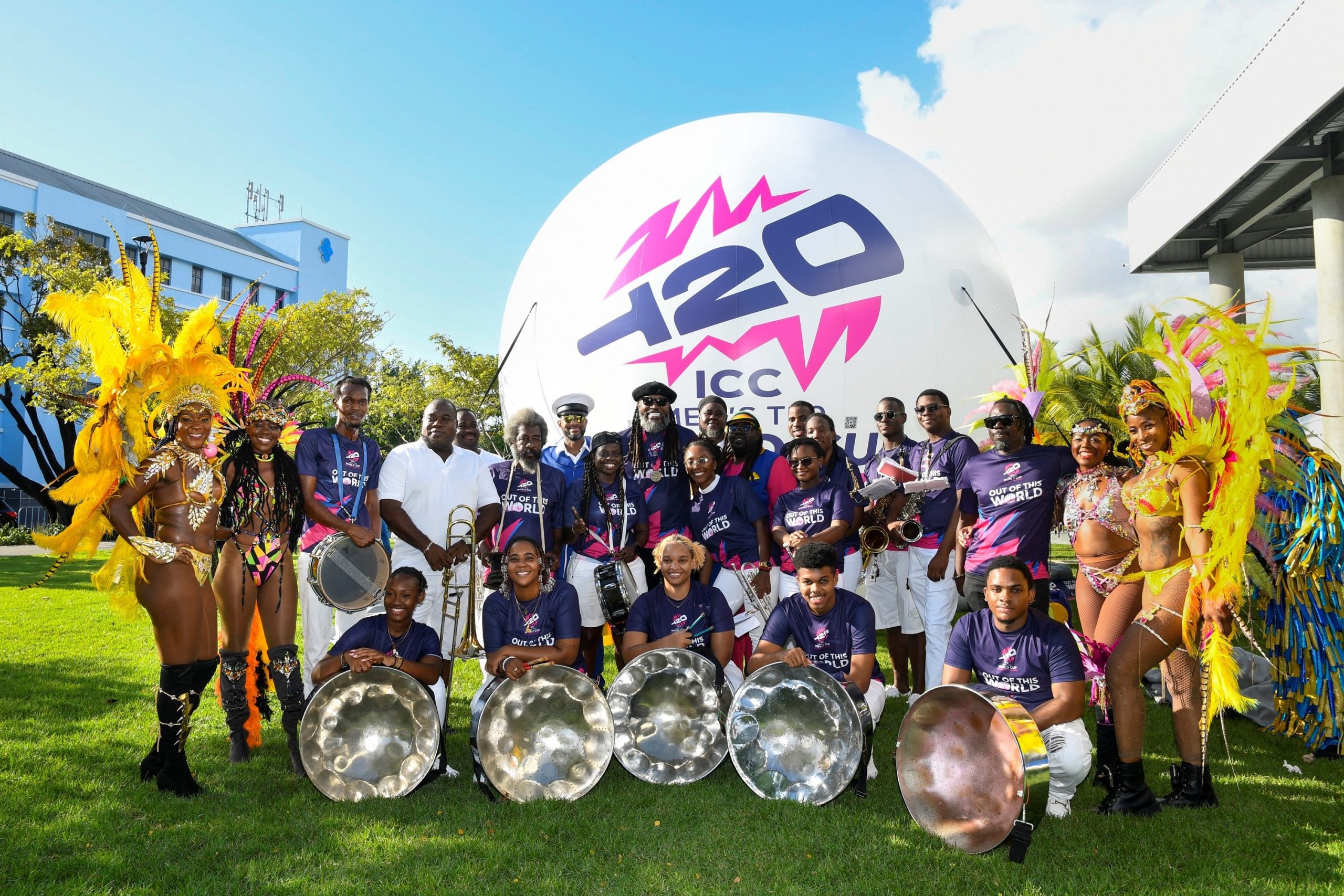 Chris Gayle of the West Indies poses with the band and dancers