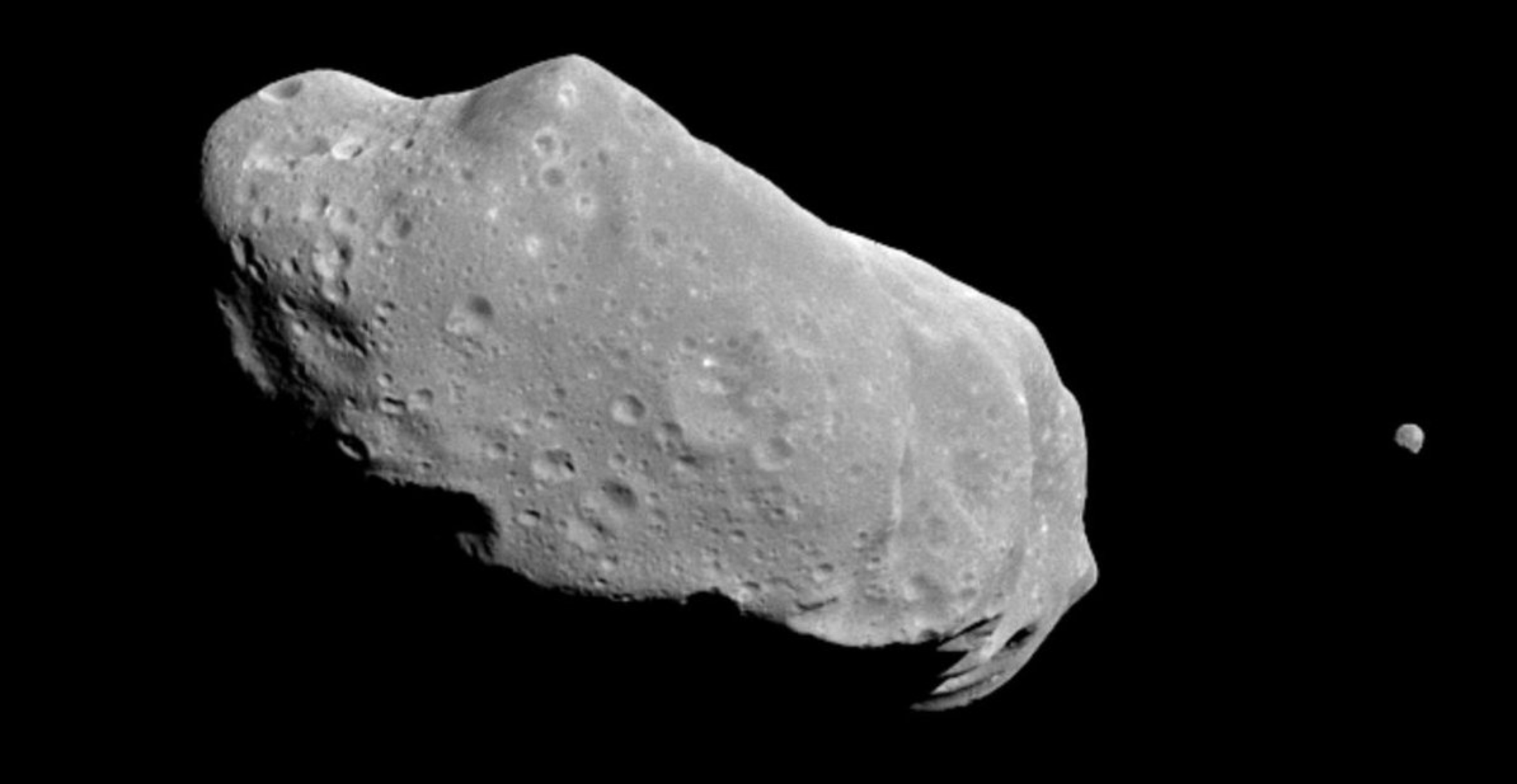 The asteroid 243 Ida and its small moon as imaged by NASA's Galileo spacecraft in August 1993.