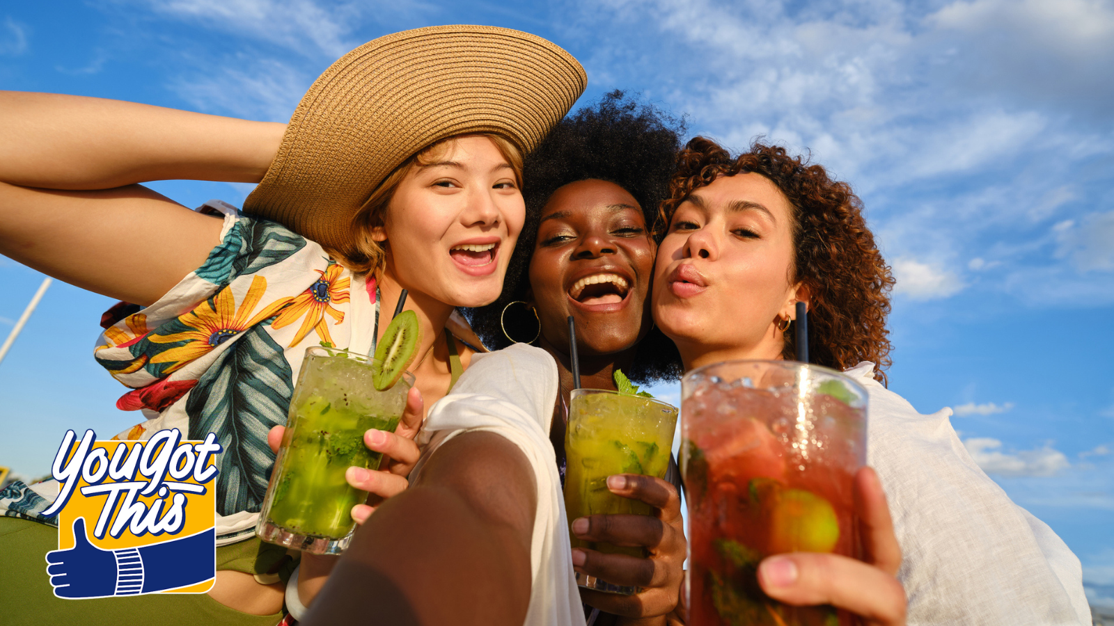 Happy three women taking a selfie drinking cocktails in summer - stock photo