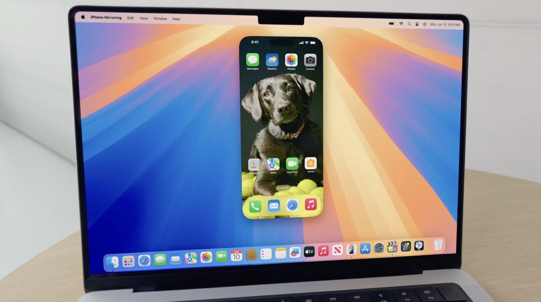 MacBook featuring iPhone mirroring feature on screen