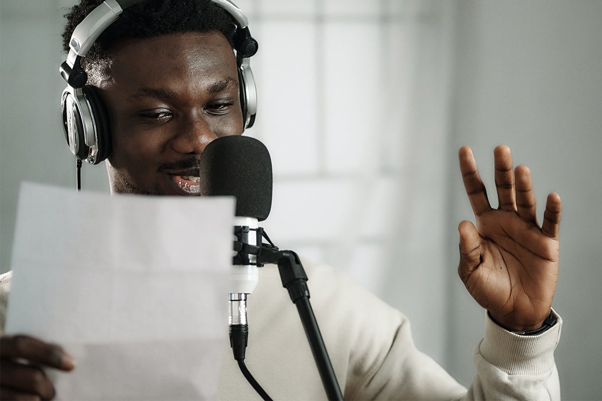 Man speaking into microphone.