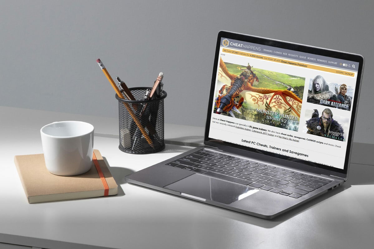 Laptop on white desk.