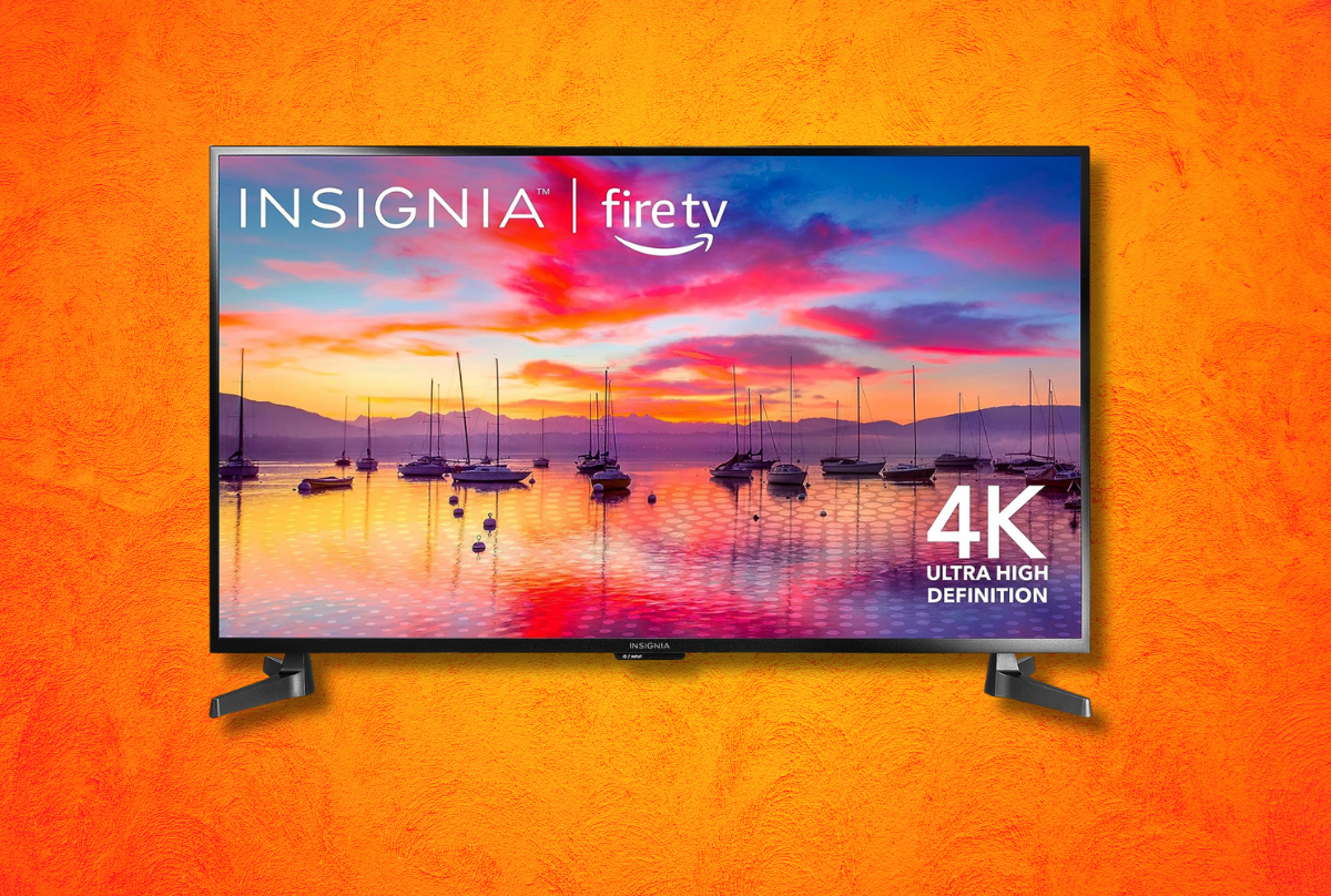 INSIGNIA tv against an orange background 