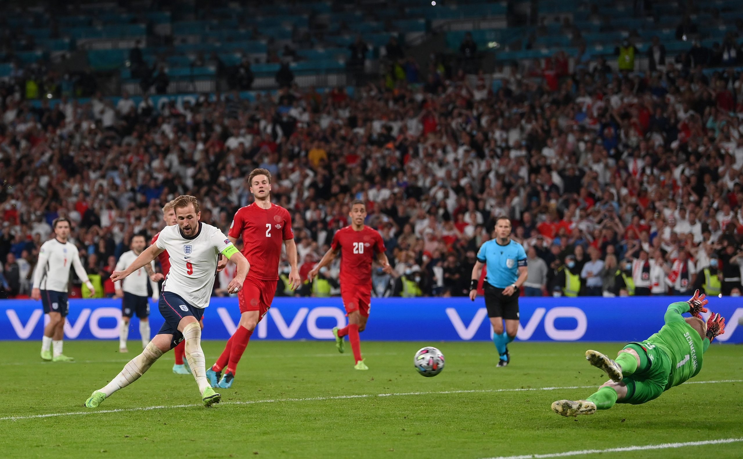 Harry Kane of England scores