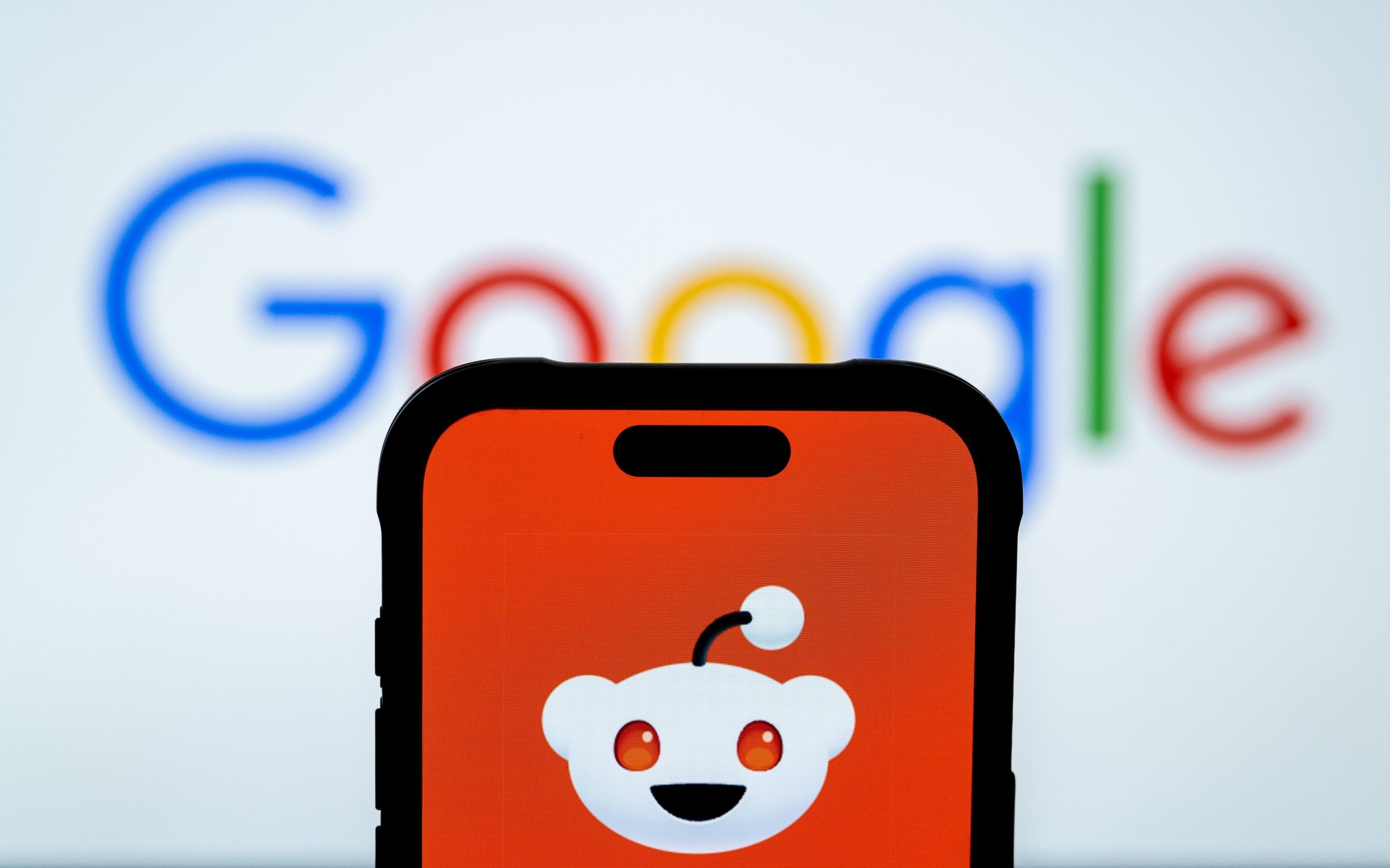 Reddit and Google logos