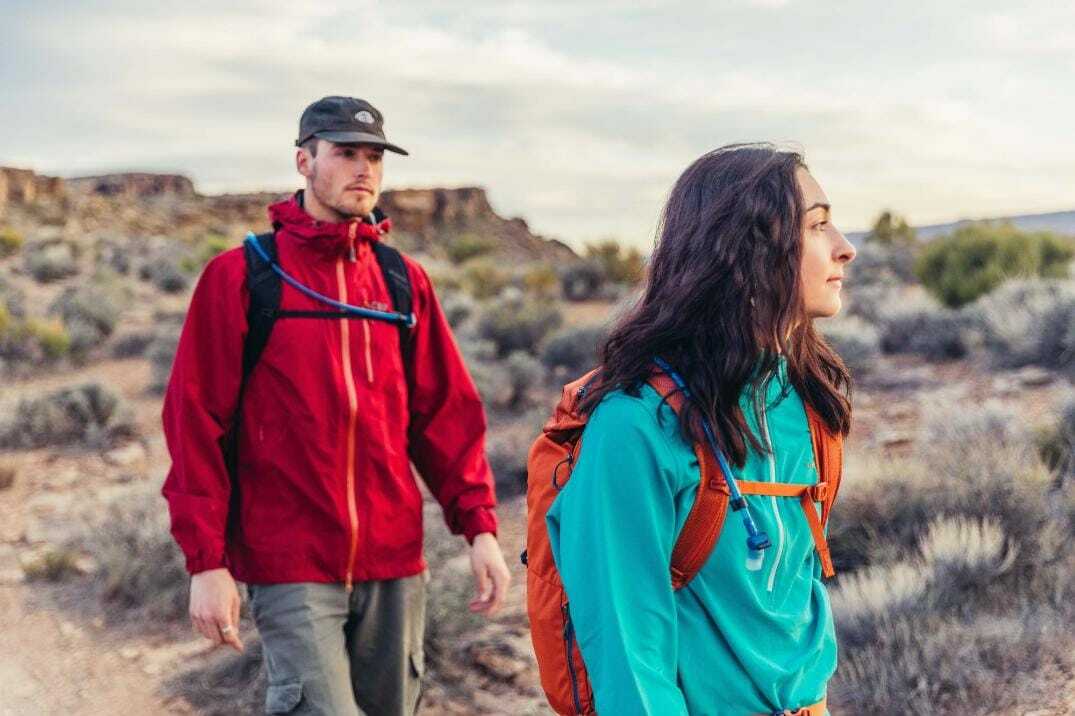 Two hikers wear Gregory backpacks 