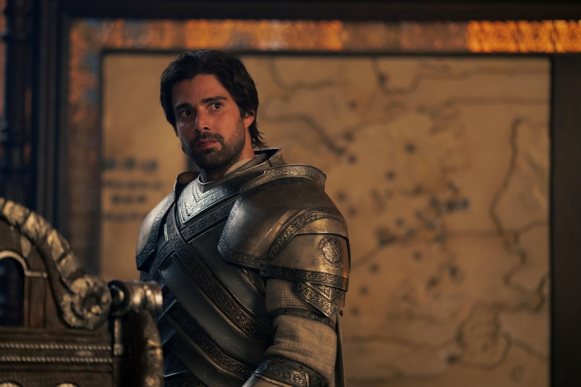 Actor Fabien Frankel as Ser Criston Cole wearing a suit of armor in the show House of the Dragon