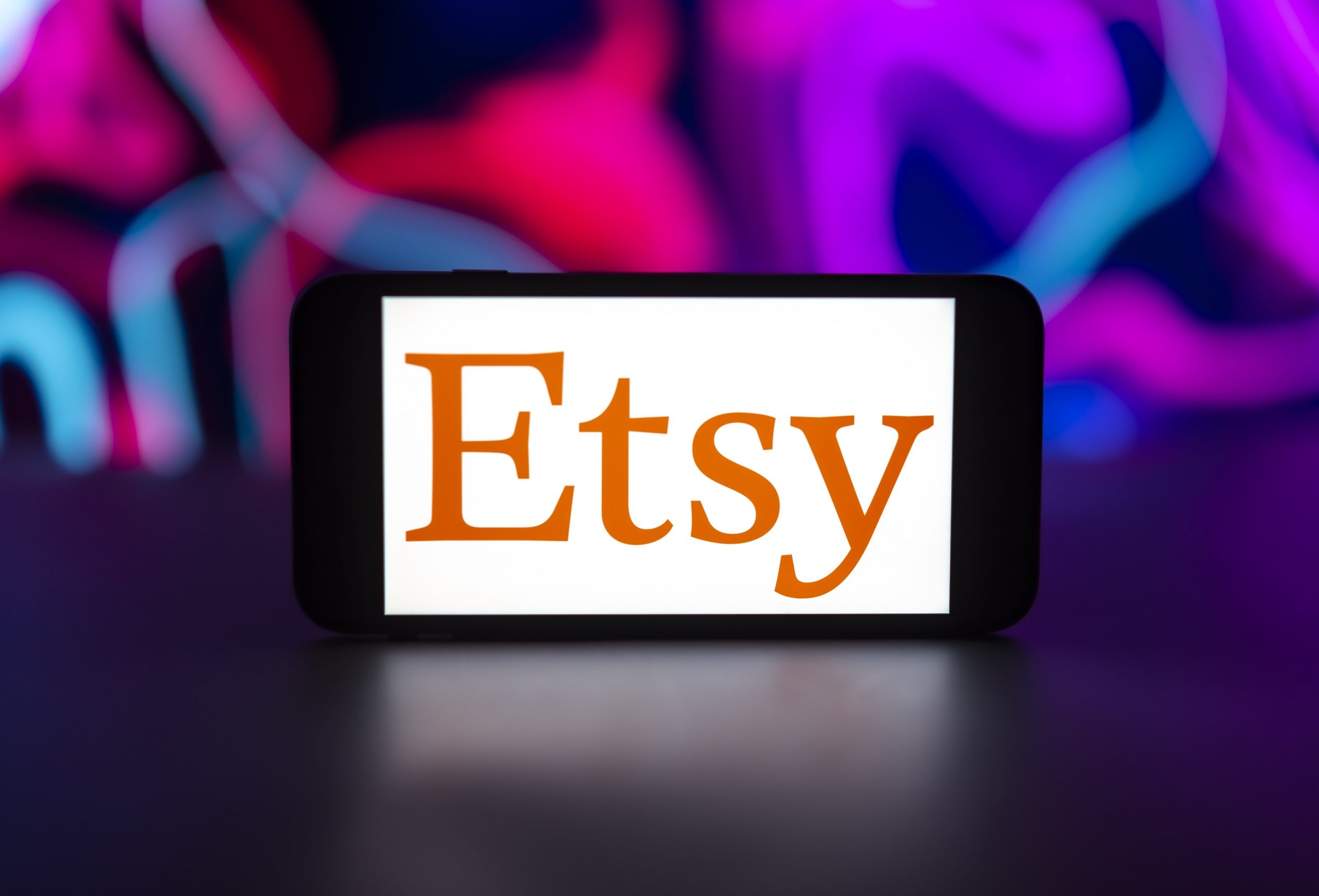 Etsy logo is seen displayed on a mobile phone screen