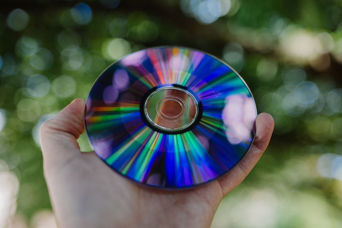 Person holding a DVD