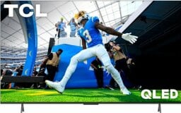 TCL QLED TV with football player in stadium on screen