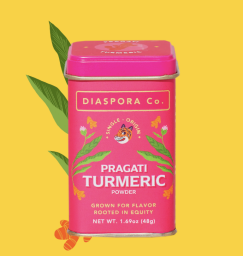 A pink can of Diaspora Co. Pragati Turmeric