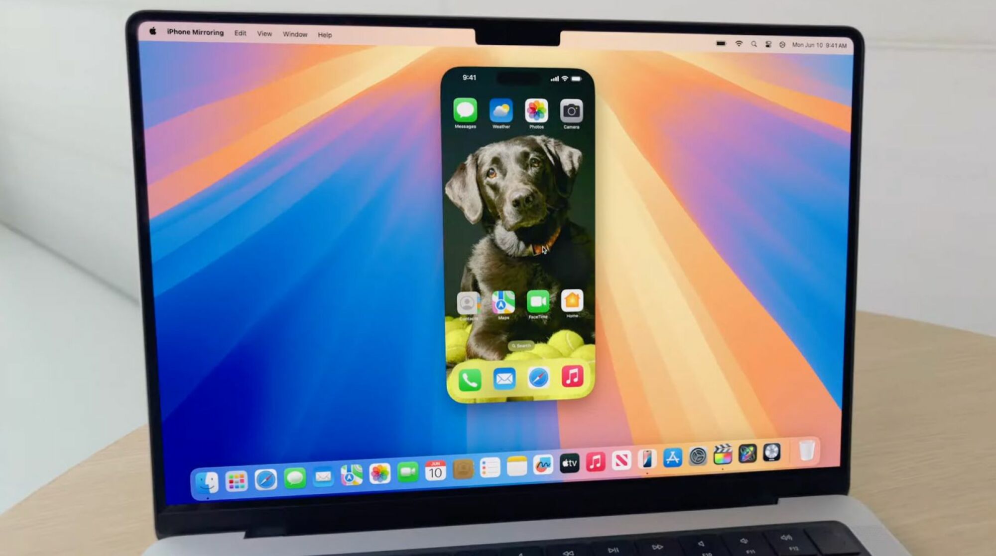 MacBook showing iPhone Mirroring on screen 