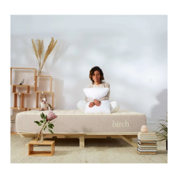 Birch Natural Mattress in bedroom with woman on top