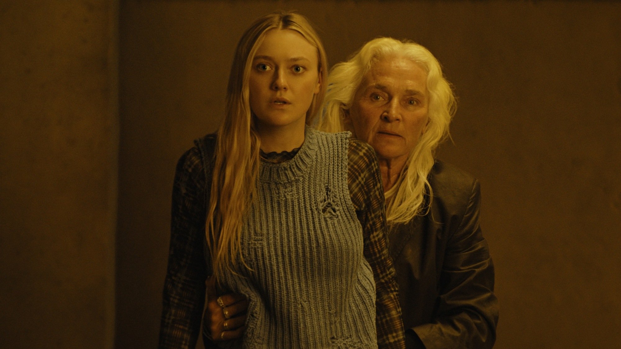 Olwen Fouéré and Dakota Fanning stick together in "The Watchers."