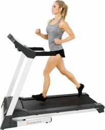 woman running on treadmill