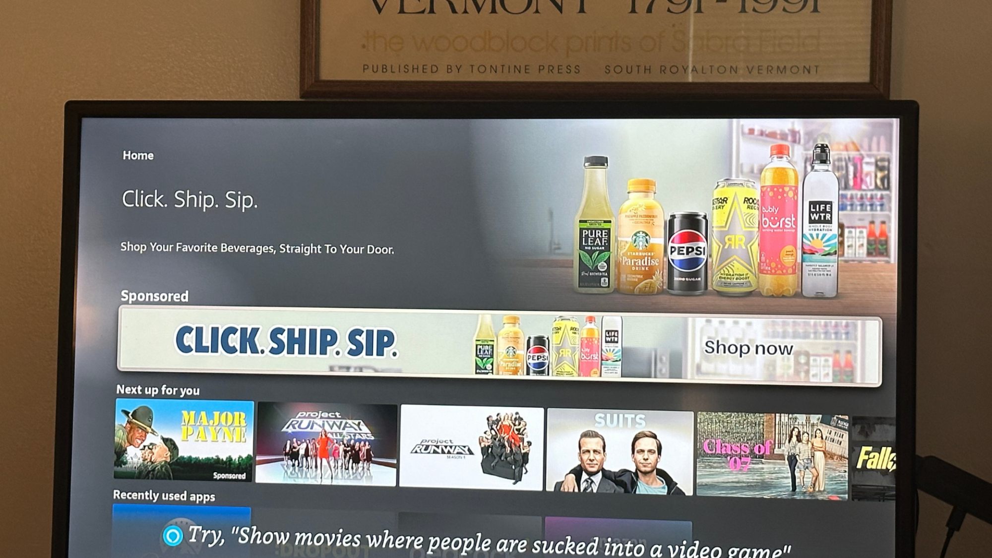 TV screen showing a beverage ad.