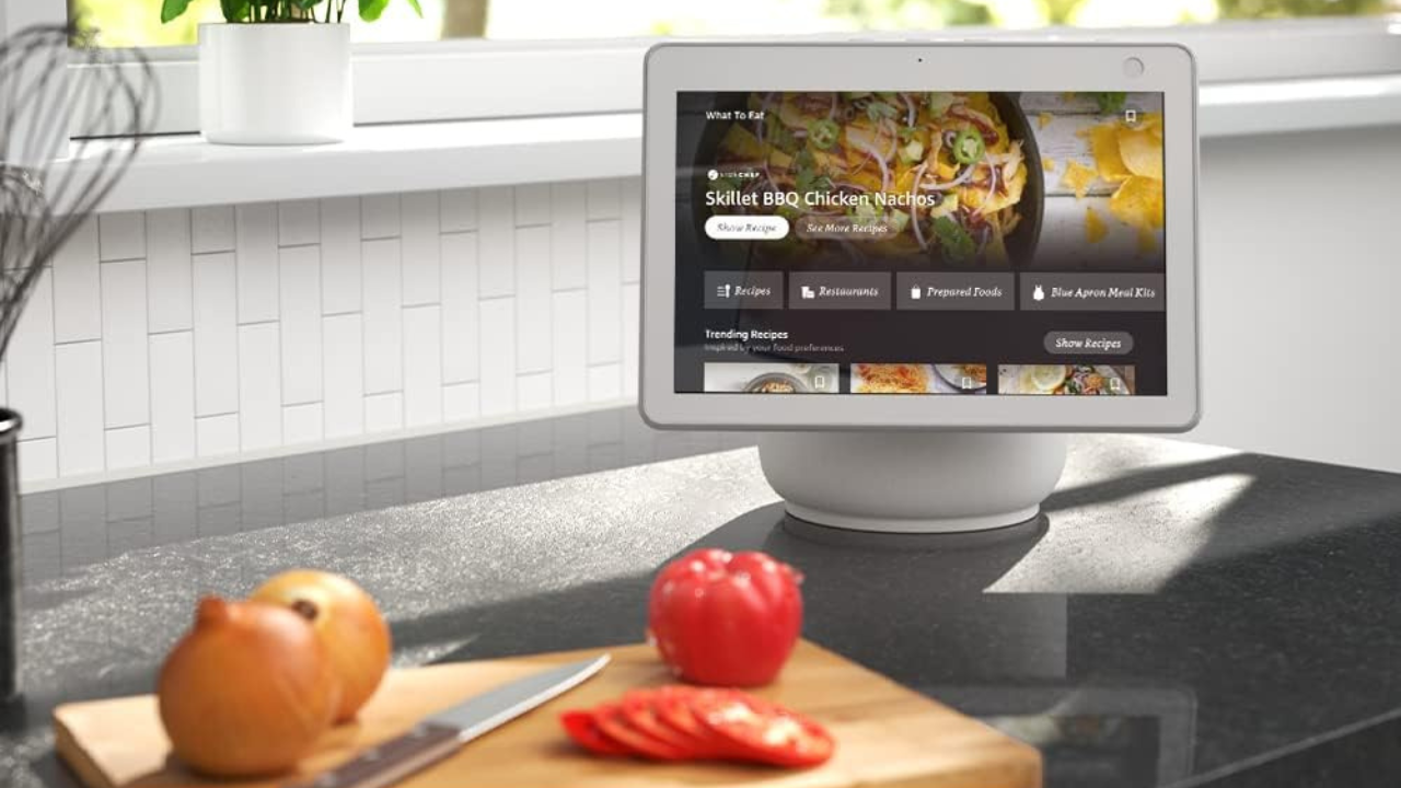 echo show 10 on kitchen counter by cutting board with vegetables