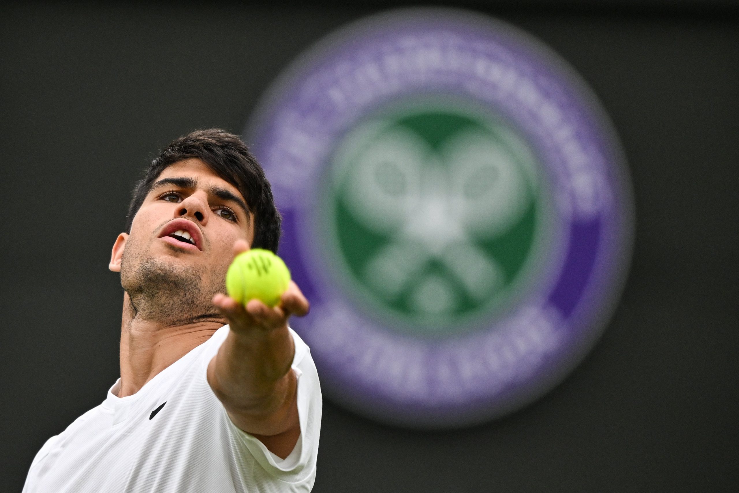 Alcaraz serves at Wimbledon