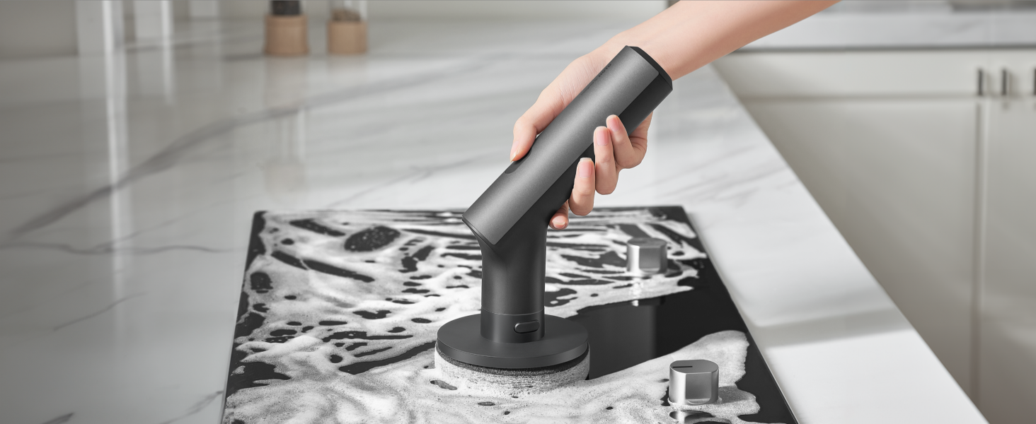 The HOTO Electric Spin Scrubber cleans a stovetop 